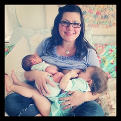 beautiful breastfeeding, cuddling, feeding two kids