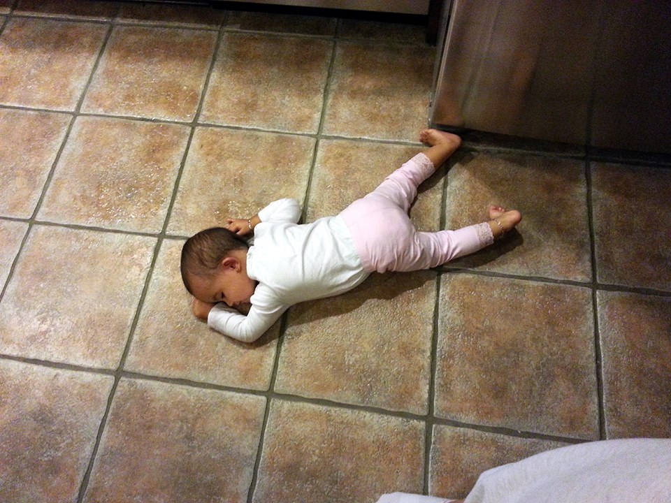 sleeping on the hard tile floor